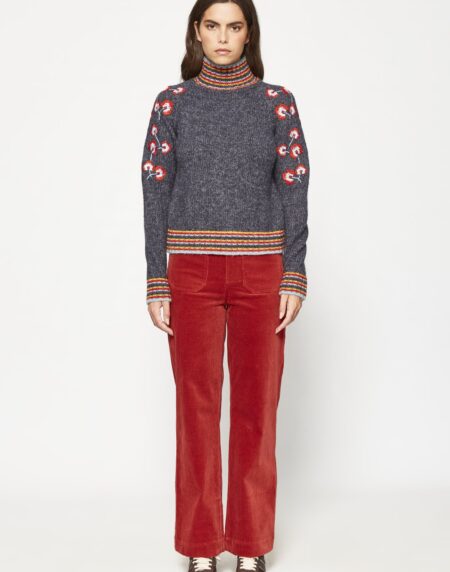 Jersey cuello alto con bordados